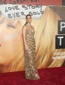 Lily James Cleavage in a Golden Dress at “Pam & Tommy” Finale Premiere in Los Angeles