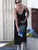 Lucy Hale in a Long Black Frock Leaving a Salon in West Hollywood