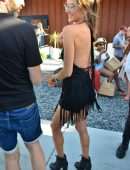 Alessandra Ambrosio in a Backless Dress at Rolling Stone Meta Pool Party in Palm Springs