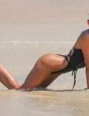 Izabel Goulart Booty in Black Thong Swimsuit on a Beach in Rio de Janeiro