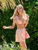 Joy Corrigan Leggy and Cleavage at Revolve Pool Party in Indio
