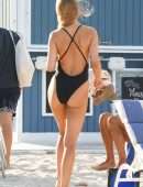 Kimberley Garner Booty in a Black Swimsuit on the Beach in Miami