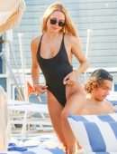Kimberley Garner Booty in a Black Swimsuit on the Beach in Miami