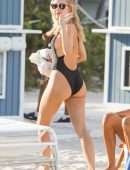 Kimberley Garner Booty in a Black Swimsuit on the Beach in Miami