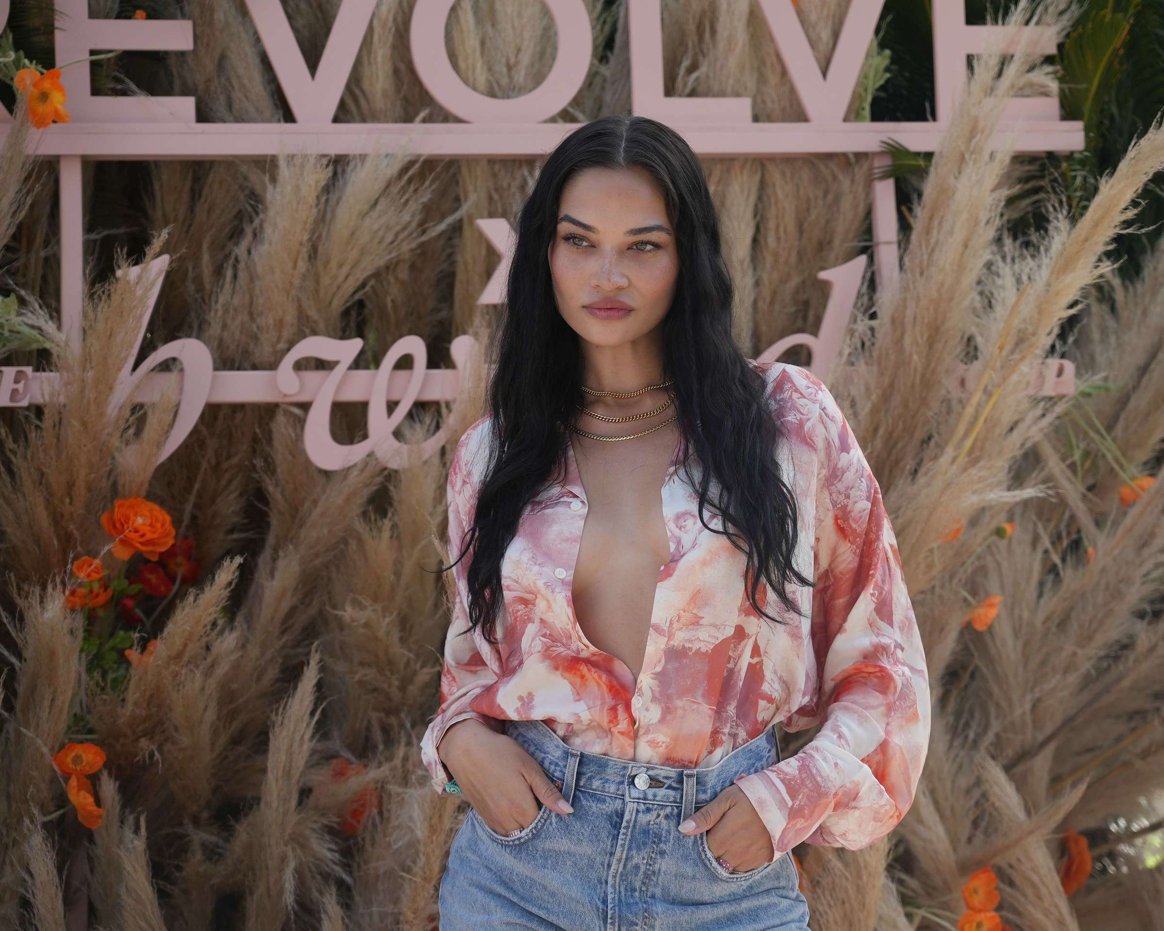 Shanina Shaik Cleavage in an Unbuttoned Shirt at REVOLVE FESTIVAL - Day 1 at Coachella in La Quinta