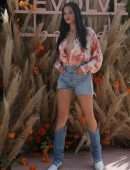 Shanina Shaik Cleavage in an Unbuttoned Shirt at REVOLVE FESTIVAL - Day 1 at Coachella in La Quinta