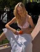 Alexis Ren in a White Skirt Photoshoot Under the Sun