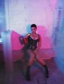 Demi Lovato Leggy and Cleavage in Leather Outfit