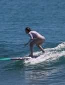 Jessica Biel in Swimsuit Surfing at JT Cabo Beach