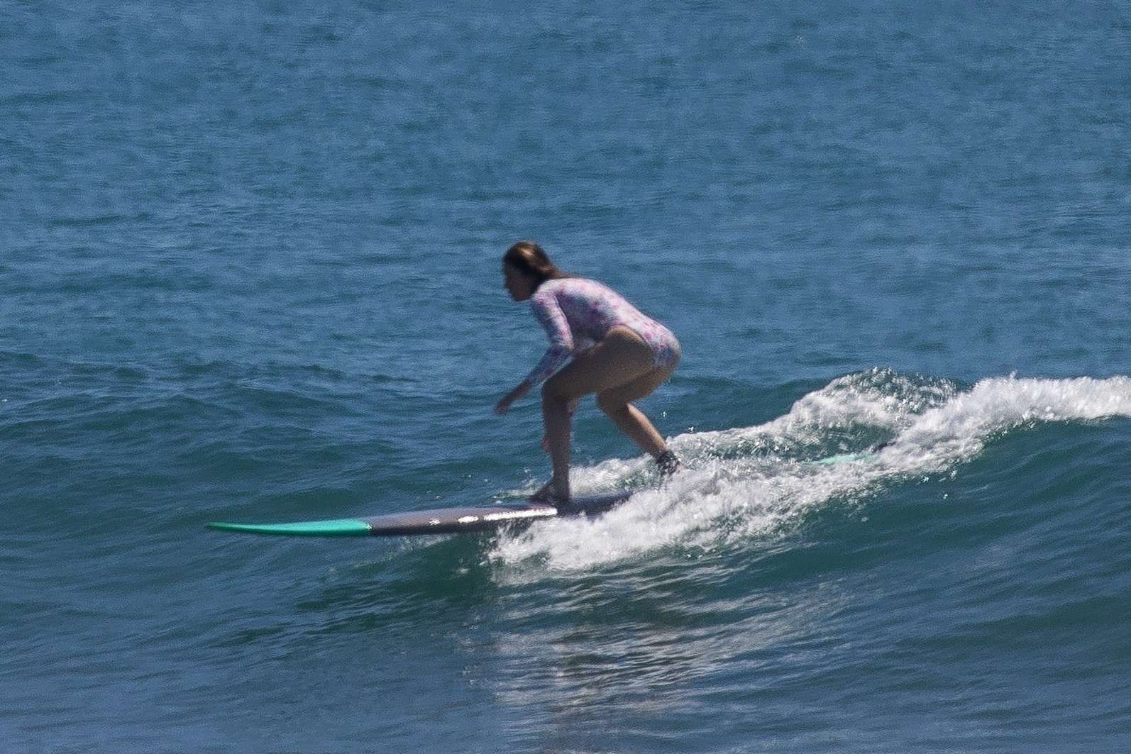 Jessica Biel in Swimsuit Surfing at JT Cabo Beach