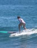 Jessica Biel in Swimsuit Surfing at JT Cabo Beach