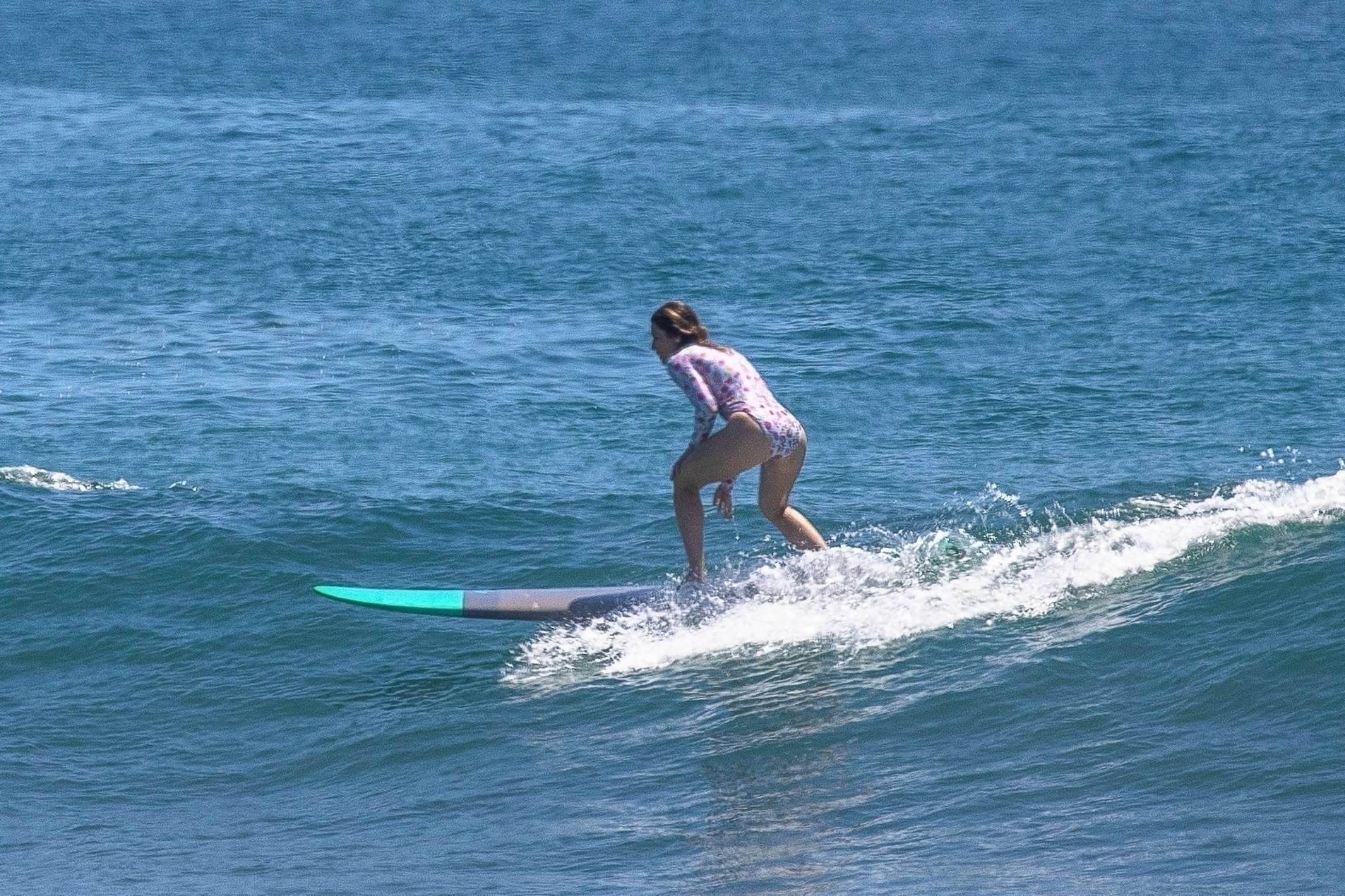Jessica Biel in Swimsuit Surfing at JT Cabo Beach