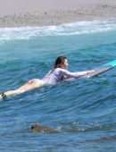 Jessica Biel in Swimsuit Surfing at JT Cabo Beach
