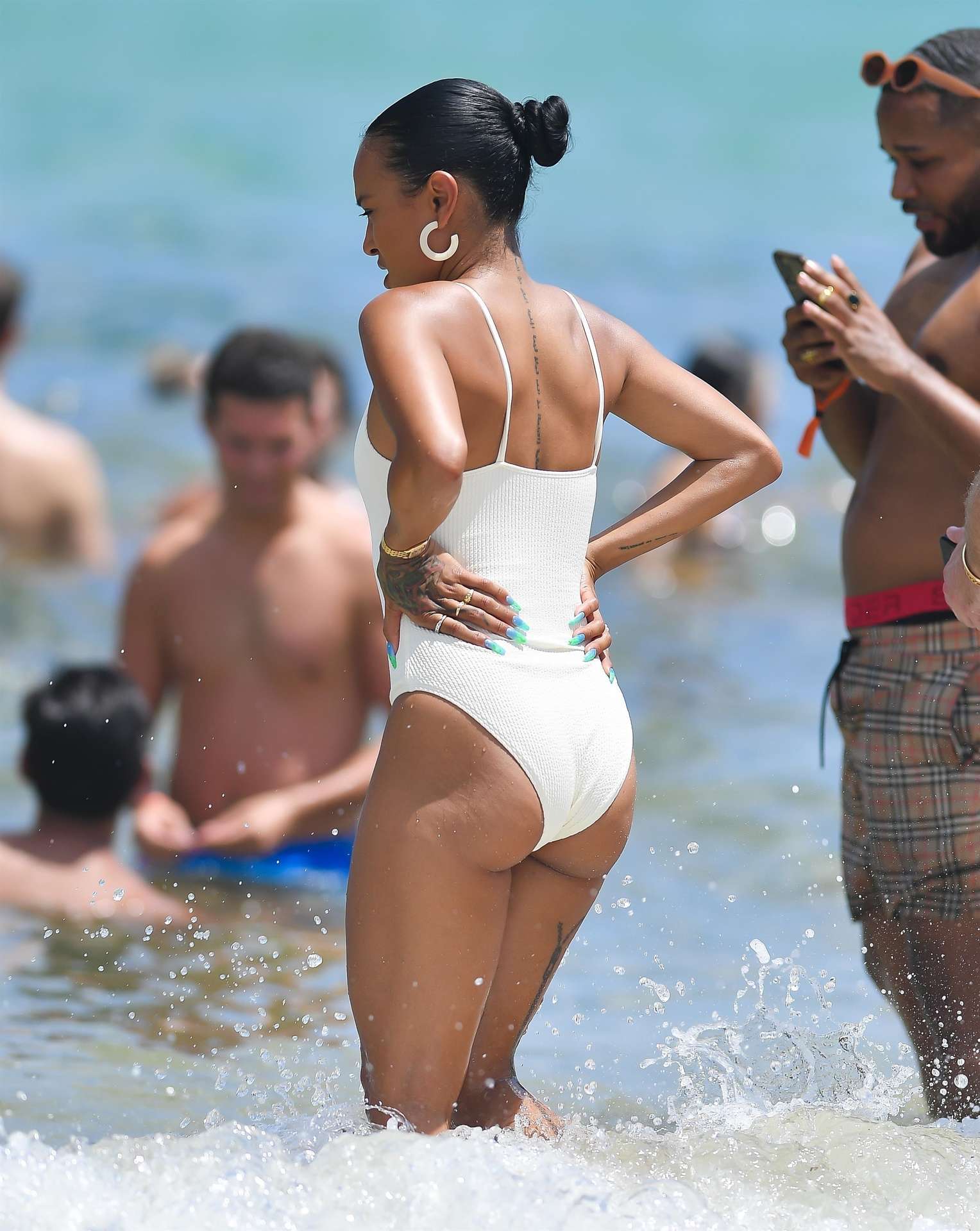 Karrueche Tran Booty in Swimsuit on a Beach in Miami