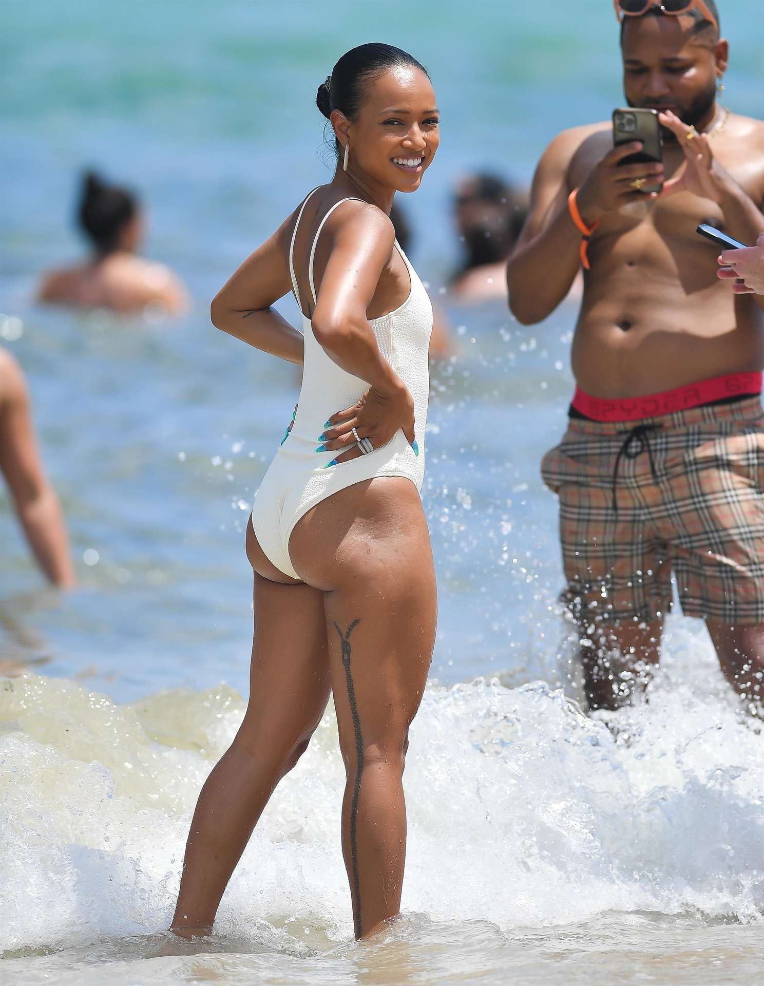 Karrueche Tran Booty in Swimsuit on a Beach in Miami