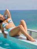Moira Tumas in Bikini for Fitness Streaming Platform BeachSweat at Sir Ivan Wilzig’s Castle