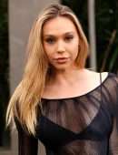 Alexis Ren Booty in See-Through Dress at “Jurassic World: Dominion” Premiere in Los Angeles