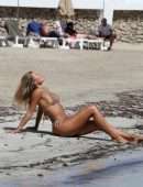 Arabella Chis Booty in Thong Bikini on a Beach in Formentera