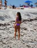 Camila Coelho Pregnant, Shows off at the Beach in a Purple Bikini in Miami