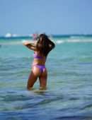 Camila Coelho Pregnant, Shows off at the Beach in a Purple Bikini in Miami