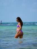 Camila Coelho Pregnant, Shows off at the Beach in a Purple Bikini in Miami