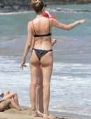 Behati Prinsloo in Black Bikini at the Beach in Maui