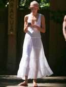 Candice Swanepoel in a White Dress, Seen on a Stroll Through the Trancoso Mainland