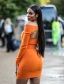 Ciara Booty in Orange Dress at Serpentine Summer Evening Event in London