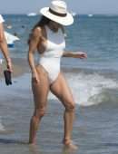 Eva Longoria Booty in a White Swimsuit on a Beach in Marbella