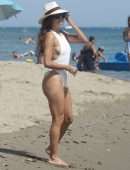 Eva Longoria Booty in a White Swimsuit on a Beach in Marbella