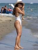 Eva Longoria Booty in a White Swimsuit on a Beach in Marbella