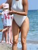 Eva Longoria Booty in a White Swimsuit on a Beach in Marbella