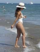 Eva Longoria Booty in a White Swimsuit on a Beach in Marbella