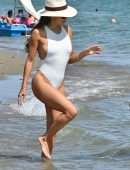 Eva Longoria Booty in a White Swimsuit on a Beach in Marbella