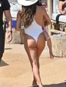 Eva Longoria Booty in a White Swimsuit on a Beach in Marbella