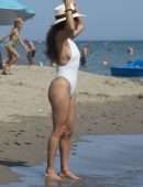 Eva Longoria Booty in a White Swimsuit on a Beach in Marbella