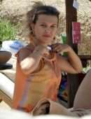 Millie Bobby Brown Booty in Thong Bikini at a Beach in Sardinia