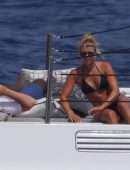 Sofia Richie in Black Bikini on a Yacht in Ibiza