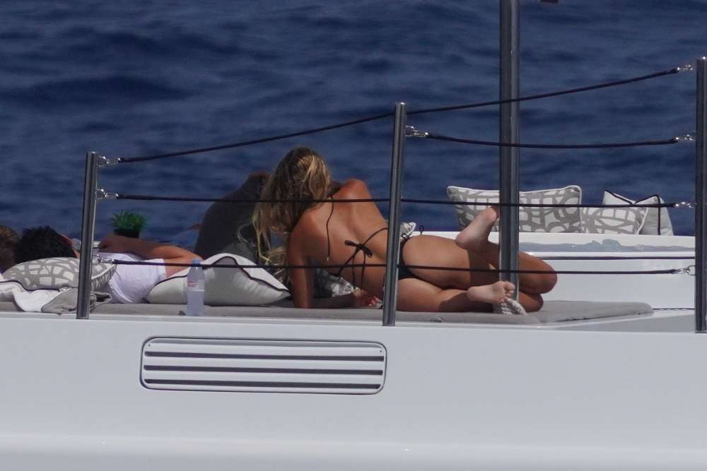 Sofia Richie in Black Bikini on a Yacht in Ibiza