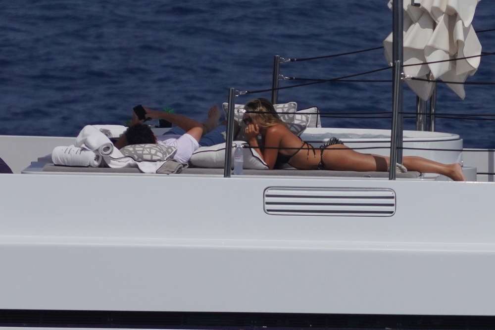 Sofia Richie in Black Bikini on a Yacht in Ibiza