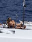 Sofia Richie in Black Bikini on a Yacht in Ibiza