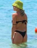 Ashley Roberts Booty in a Black Bikini on the Beach in Mykonos