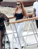 Bella Thorne Booty in Black Swimsuit on a Yacht in Mykonos