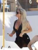 Bianca Gascoigne in a Black Swimsuit at Ibiza’s Cala de Bou Beach