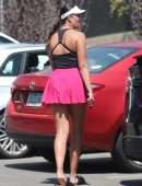 April Love Geary Leggy in Skirt Posing after Her Tennis Class in Malibu