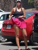 April Love Geary Leggy in Skirt Posing after Her Tennis Class in Malibu