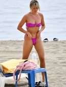 Ashley Roberts in a Pink Bikini on the Beach in Marbella