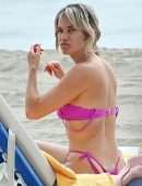 Ashley Roberts in a Pink Bikini on the Beach in Marbella