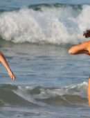 Lara Bingle and Phoebe Tonkin in Black Swimsuit at a Beach in Sydney