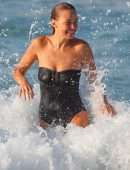 Lara Bingle and Phoebe Tonkin in Black Swimsuit at a Beach in Sydney